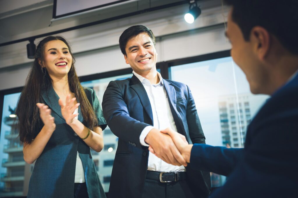 Business people shake hands Symbols of business cooperation